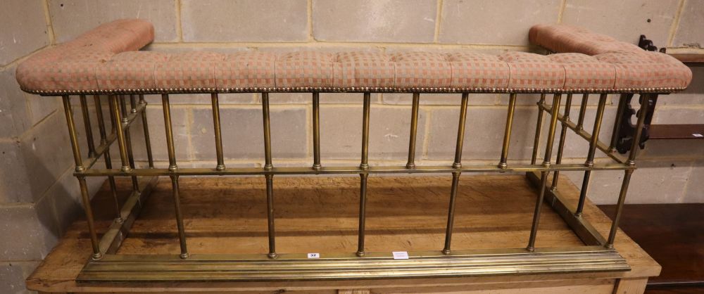 A Victorian brass club fender, width 164cm depth 70cm height 59cm